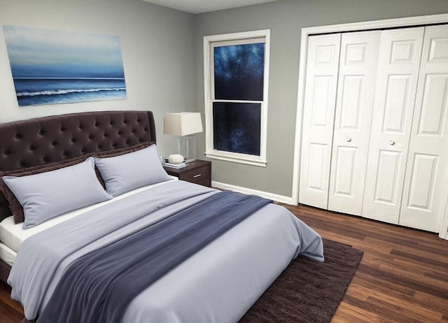 bedroom featuring baseboards, wood finished floors, and a closet