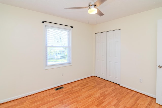 406 Kenway St, Berea, KY 40403 - unfurnished bedroom featuring visible vents, a ceiling fan, light wood-type flooring, a closet, and baseboards