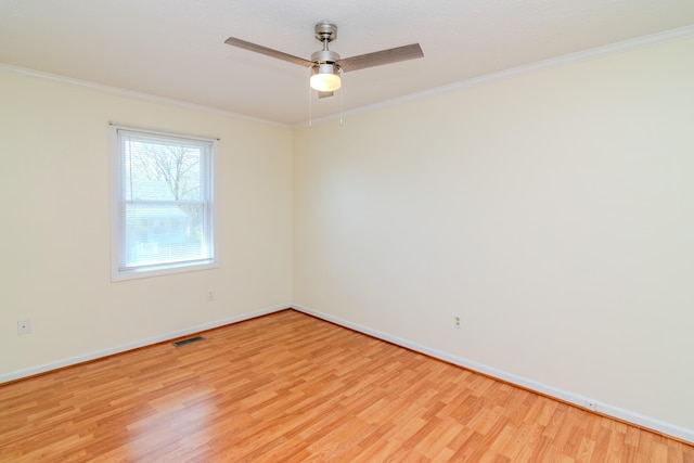 406 Kenway St, Berea, KY 40403 - unfurnished room featuring baseboards, light wood-style flooring, visible vents, and ornamental molding