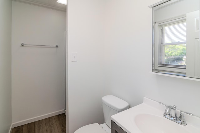 406 Kenway St, Berea, KY 40403 - bathroom with toilet, vanity, wood finished floors, and baseboards