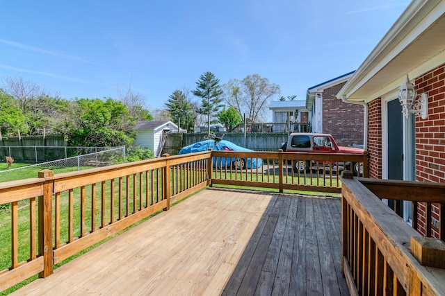 406 Kenway St, Berea, KY 40403 - wooden terrace featuring an outdoor structure, a yard, a shed, and a fenced backyard