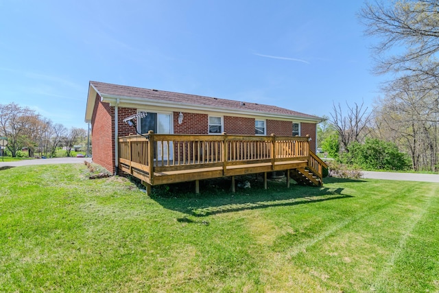 406 Kenway St, Berea, KY 40403 - rear view of property with stairway, a wooden deck, a lawn, and brick siding