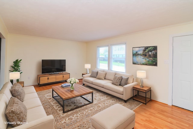 406 Kenway St, Berea, KY 40403 - living room featuring baseboards, ornamental molding, and light wood-style flooring