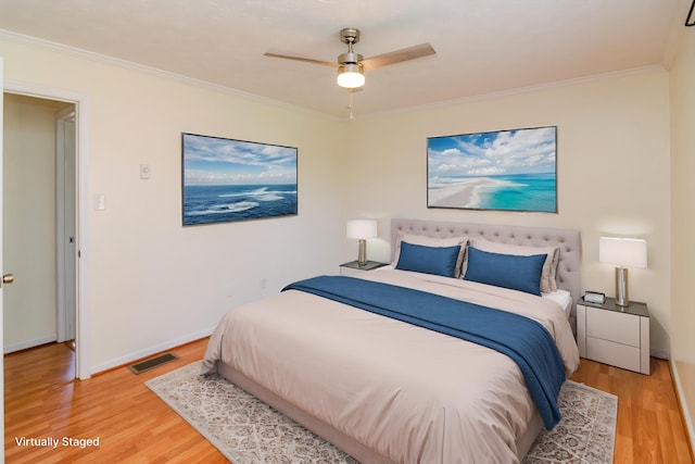 406 Kenway St, Berea, KY 40403 - bedroom with wood finished floors, ceiling fan, baseboards, ornamental molding, and visible vents