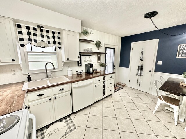 1870 Rush Branch Rd, Somerset, KY 42501 - kitchen with a textured ceiling, open shelves, white dishwasher, stove, and a sink