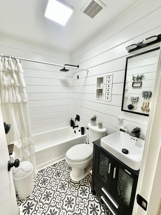 1870 Rush Branch Rd, Somerset, KY 42501 - bathroom with vanity, shower / bath combo, toilet, wood walls, and visible vents