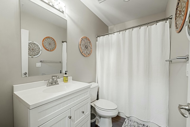 full bath with toilet, tile patterned floors, vanity, and a shower with shower curtain