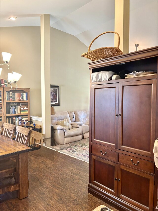 interior space with lofted ceiling and wood finished floors