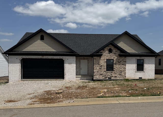view of front of home featuring brick siding, an attached garage, a shingled roof, and driveway