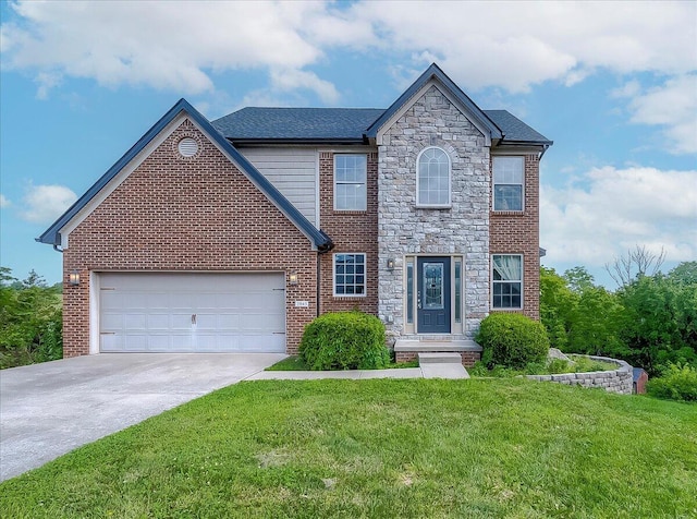 2045 Kearns Way, Richmond, KY 40475 - view of front of property with concrete driveway, a front yard, stone siding, a garage, and brick siding