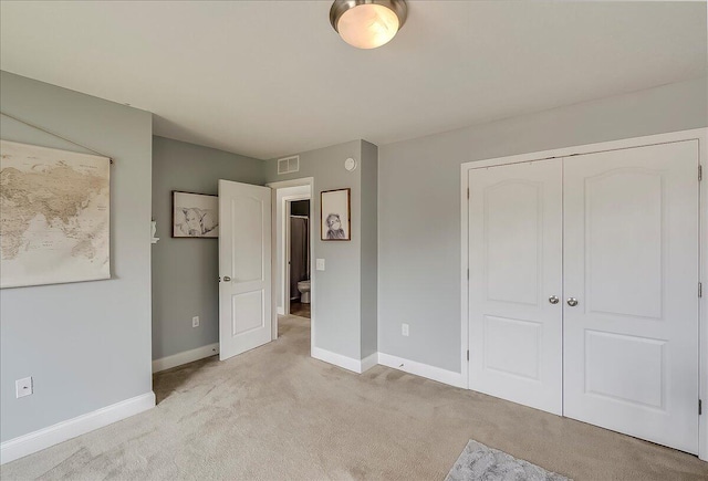 2045 Kearns Way, Richmond, KY 40475 - unfurnished bedroom with light colored carpet, baseboards, and a closet