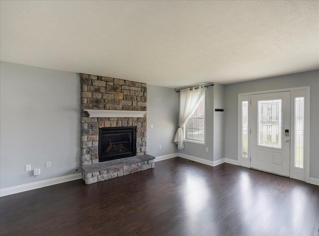 2045 Kearns Way, Richmond, KY 40475 - unfurnished living room with dark wood-style floors, baseboards, and a textured ceiling