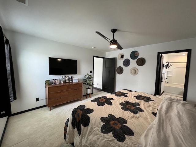 bedroom featuring baseboards, ceiling fan, and light carpet