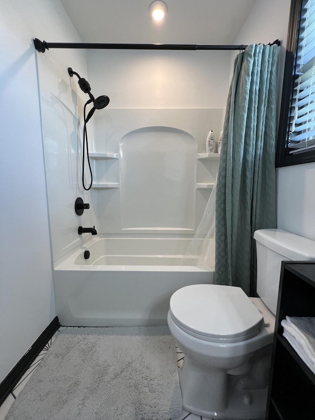 bathroom with vanity, toilet, and shower / tub combo with curtain