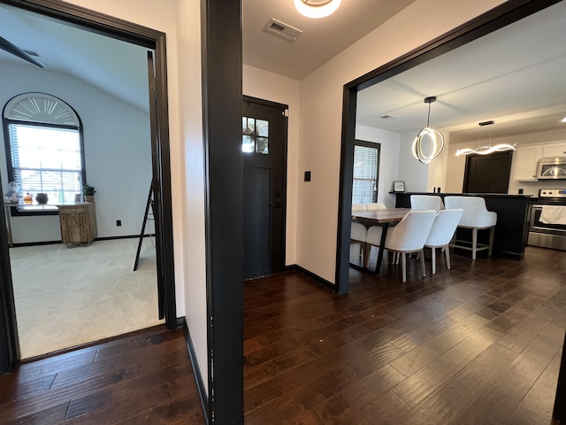 entrance foyer with baseboards, visible vents, and a wealth of natural light