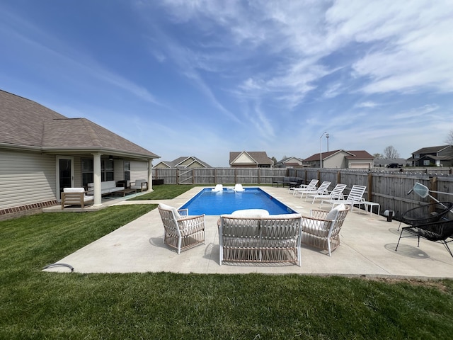 view of pool featuring an outdoor living space, a fenced in pool, a fenced backyard, a yard, and a patio