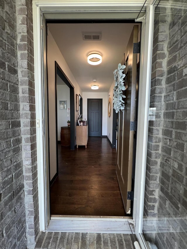 property entrance with visible vents