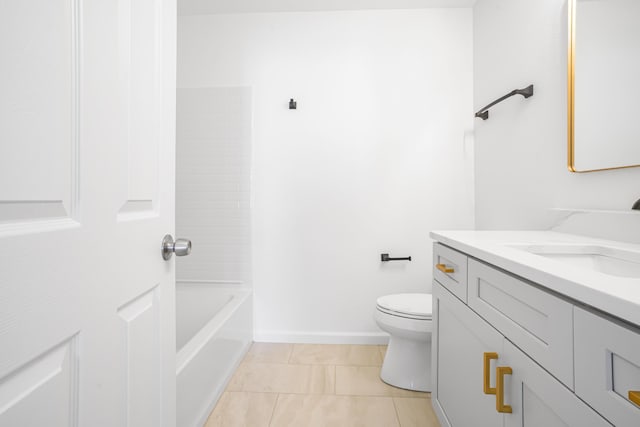 full bath featuring vanity, baseboards, tile patterned floors, and toilet