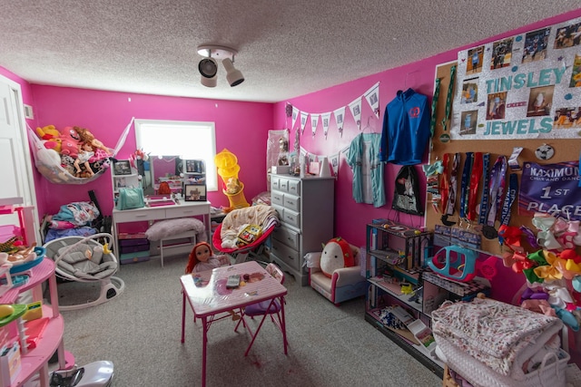 carpeted bedroom with a textured ceiling