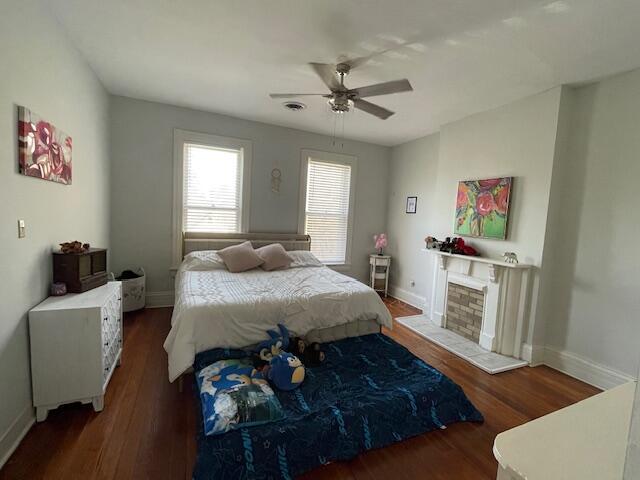 142 Old Lafayette Ave, Lexington, KY 40502 - bedroom with visible vents, wood finished floors, baseboards, and ceiling fan