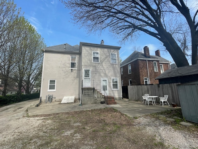 142 Old Lafayette Ave, Lexington, KY 40502 - back of property featuring a patio area, fence, and entry steps