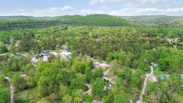 drone / aerial view with a view of trees