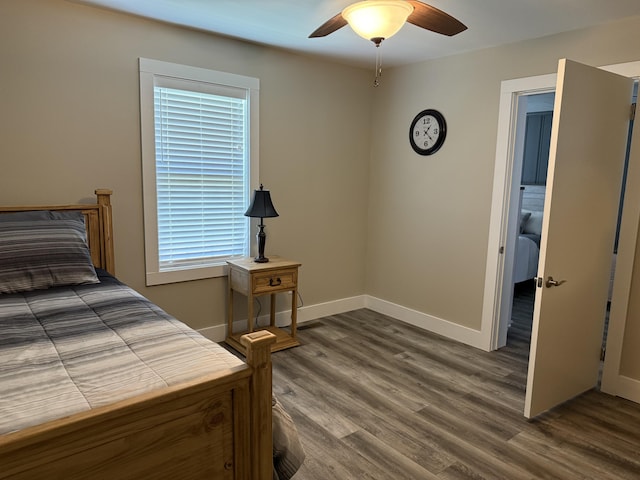 21 N Gregory St, Monticello, KY 42633 - bedroom featuring baseboards, a ceiling fan, and wood finished floors
