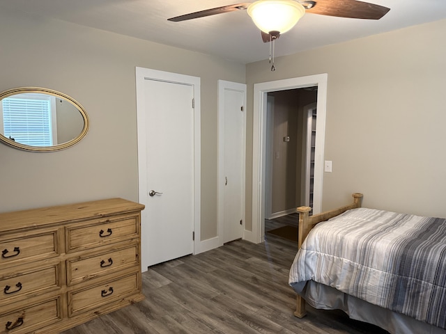 21 N Gregory St, Monticello, KY 42633 - bedroom with ceiling fan, baseboards, and dark wood finished floors