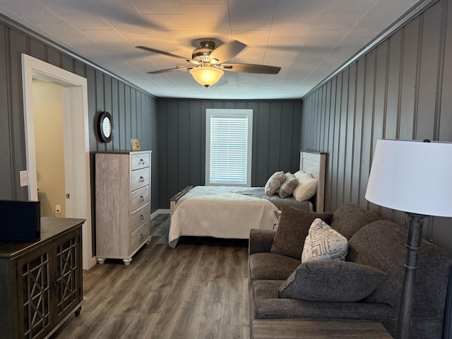 21 N Gregory St, Monticello, KY 42633 - bedroom featuring crown molding, a decorative wall, dark wood-style flooring, and a ceiling fan