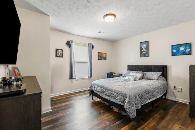 357 Burchwood Dr, Berea, KY 40403 - bedroom with baseboards, a textured ceiling, and dark wood finished floors