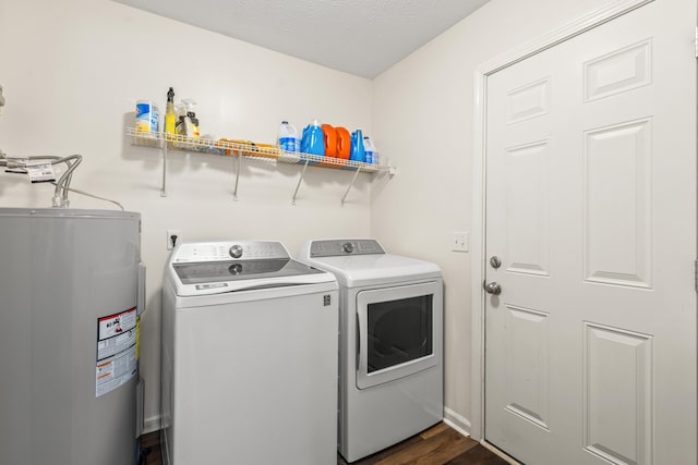 357 Burchwood Dr, Berea, KY 40403 - clothes washing area with laundry area, dark wood-style floors, washing machine and dryer, and water heater