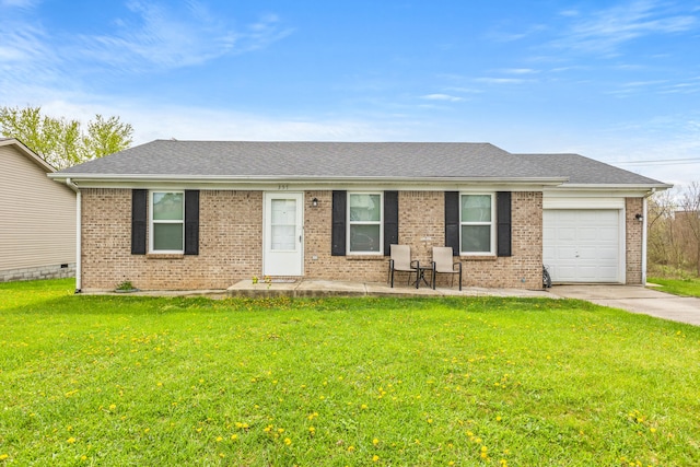 357 Burchwood Dr, Berea, KY 40403 - ranch-style house featuring a shingled roof, a garage, brick siding, a front lawn, and driveway