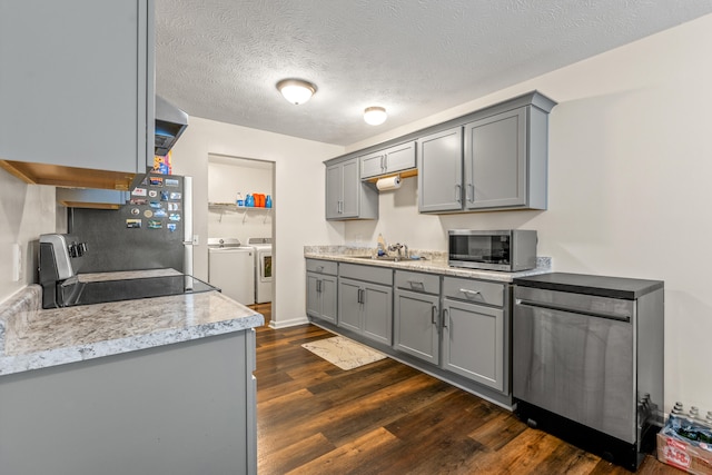357 Burchwood Dr, Berea, KY 40403 - kitchen with dark wood-type flooring, a sink, stainless steel appliances, gray cabinetry, and washer and clothes dryer