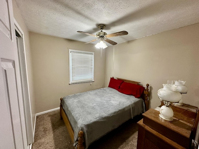 bedroom featuring a textured ceiling, ceiling fan, baseboards, and carpet floors
