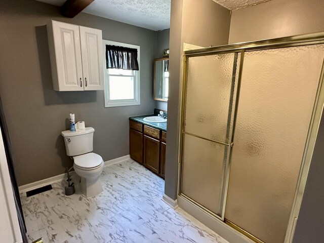 full bathroom with toilet, marble finish floor, a shower stall, and vanity