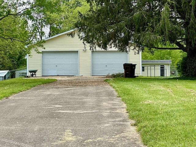 detached garage with fence