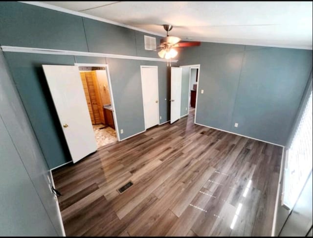 84 Summer Wind Dr, Nancy, KY 42544 - interior space with wood finished floors, ceiling fan, vaulted ceiling, and visible vents