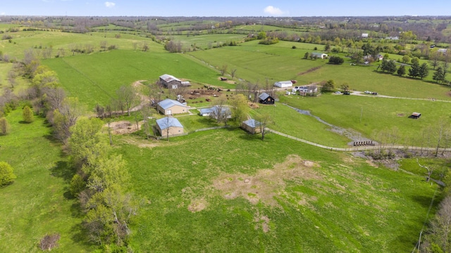 birds eye view of property featuring a rural view