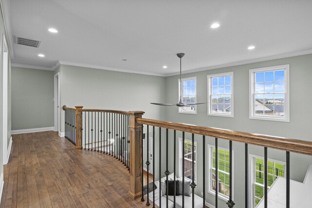 hall with recessed lighting, visible vents, and a healthy amount of sunlight