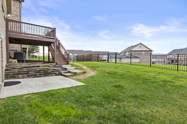 view of yard with a fenced backyard, central AC, a wooden deck, stairway, and a patio