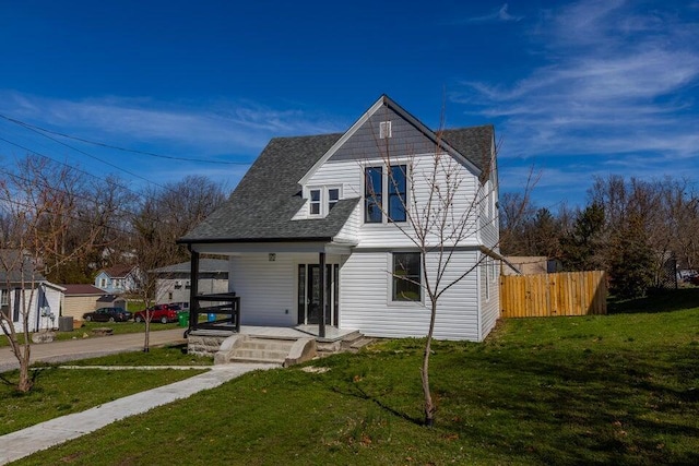 401 E Main St, Danville, KY 40422 - view of front of home featuring a porch, a front yard, fence, and roof with shingles