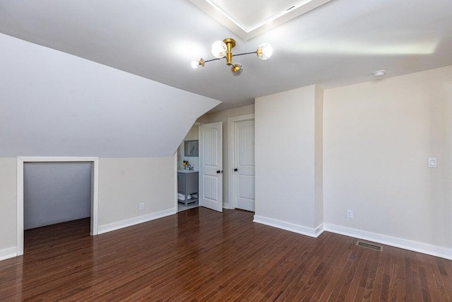 401 E Main St, Danville, KY 40422 - bonus room with lofted ceiling, wood finished floors, visible vents, and baseboards