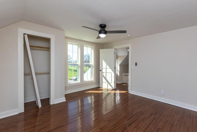 401 E Main St, Danville, KY 40422 - unfurnished bedroom featuring baseboards, wood finished floors, lofted ceiling, and a closet