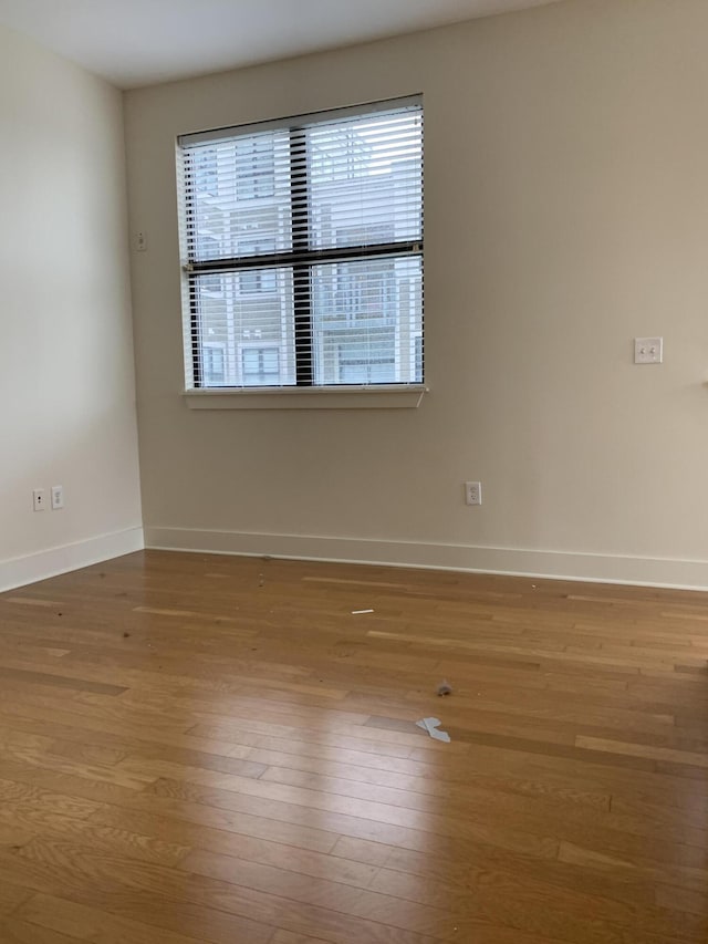 650 S Mill St Unit 218, Lexington, KY 40508 - spare room with wood finished floors and baseboards