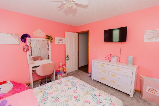 bedroom featuring ceiling fan, light carpet, and baseboards
