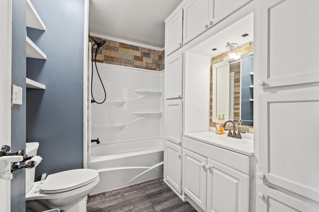 100 Lair St, Mount Vernon, KY 40456 - bathroom featuring toilet, wood finished floors, vanity, bathtub / shower combination, and a textured ceiling