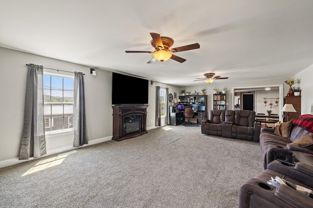 100 Lair St, Mount Vernon, KY 40456 - living room with carpet floors, ceiling fan, a glass covered fireplace, and baseboards