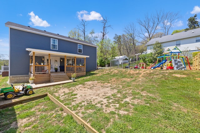 100 Lair St, Mount Vernon, KY 40456 - rear view of property featuring a playground and a yard