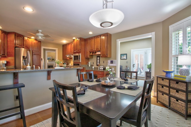 dining room with light wood-style floors, recessed lighting, and ceiling fan