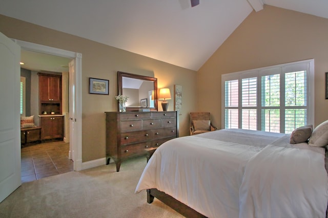 bedroom with beam ceiling, tile patterned flooring, carpet floors, high vaulted ceiling, and baseboards